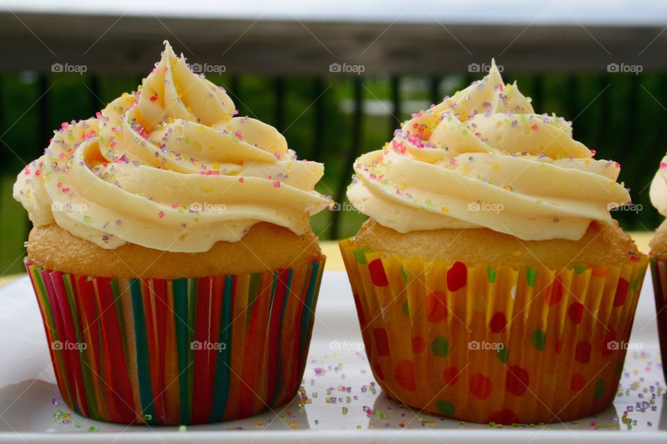 Double the Sweetness . Homemade vanilla cupcakes with buttercream icing. 