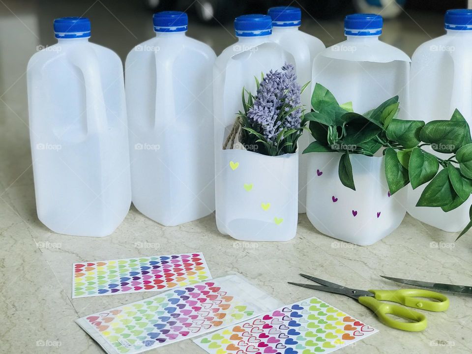 Reusable plastic milk bottles ,save nature by reusing things.