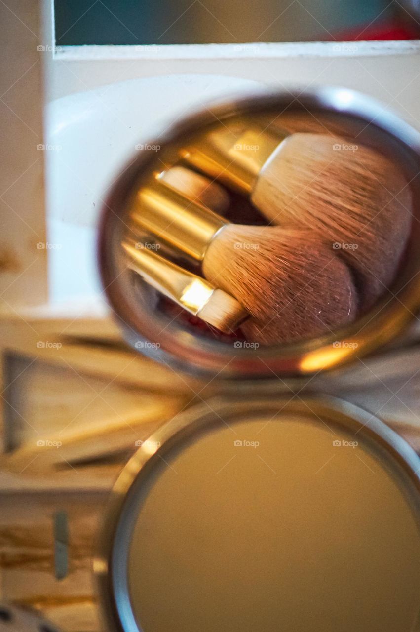 Makeup brushes and mirror