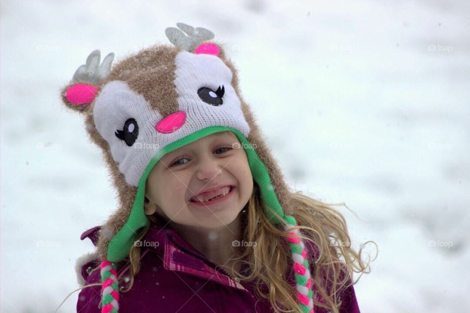 Cute little girl wearing warm clothing