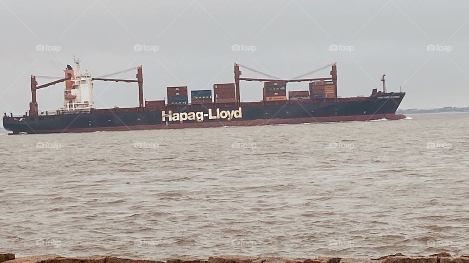 Foreign Trade Vessel in the Cross Roads of the Houston Ship Channel and the Txc Ship Channel that passes through Bolivar Peninsula out to the Gulf Of Mexico