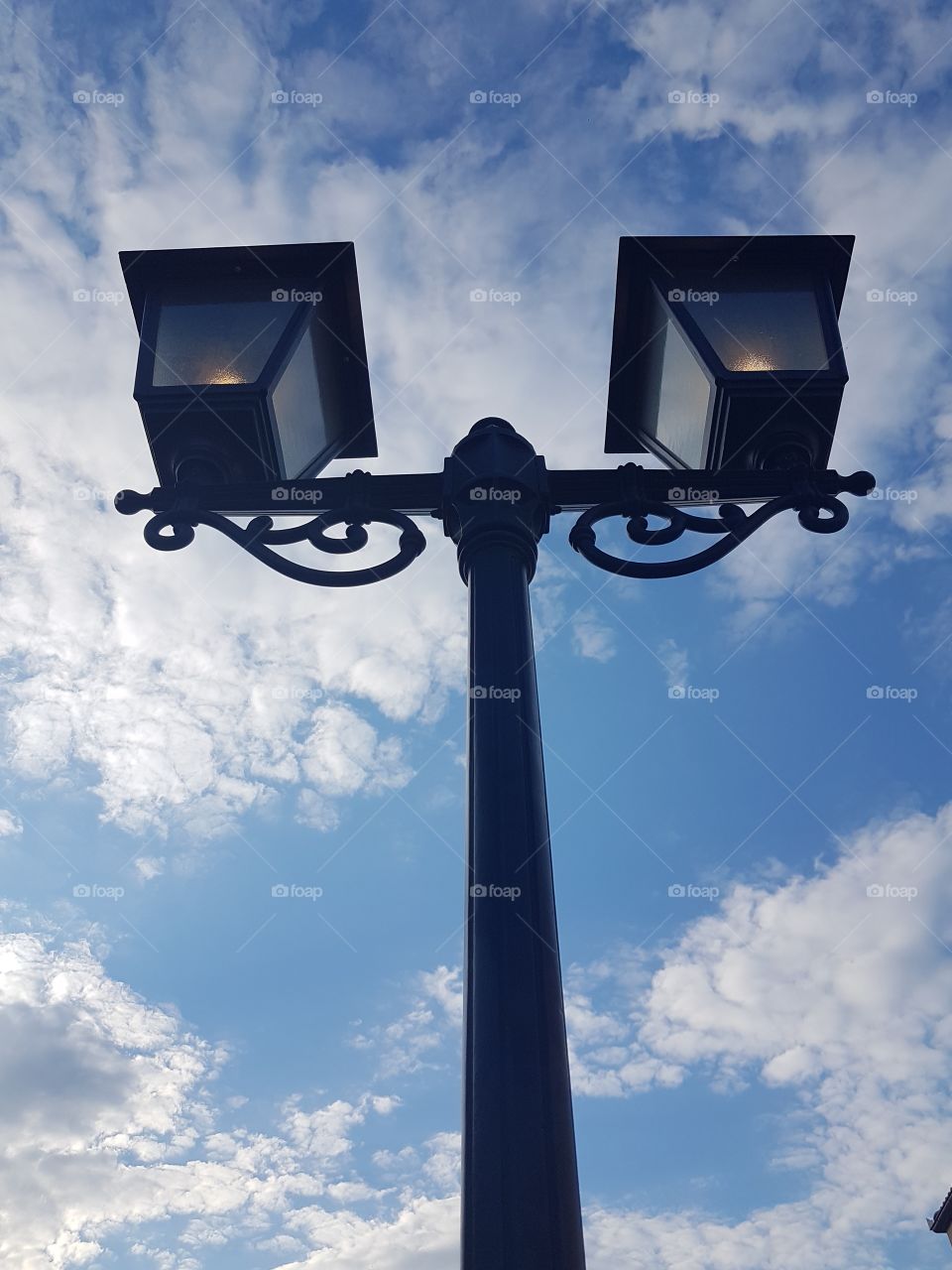 city lights, in the background is blue sky