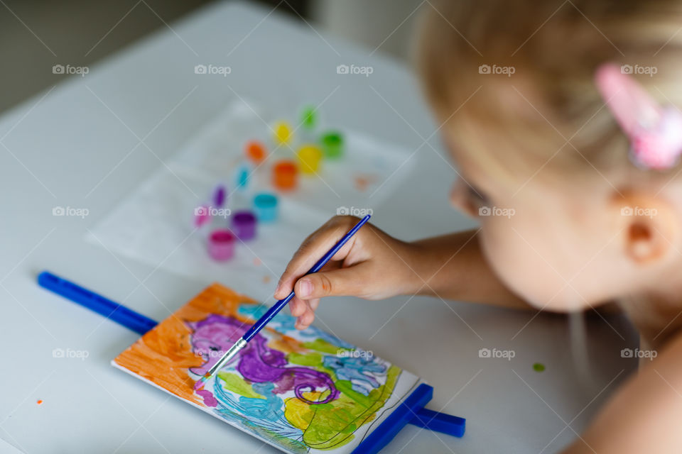 Kid painting picture 