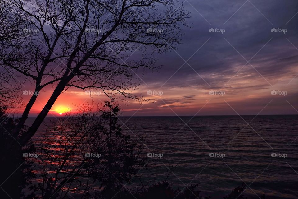 View of sunset over calm sea