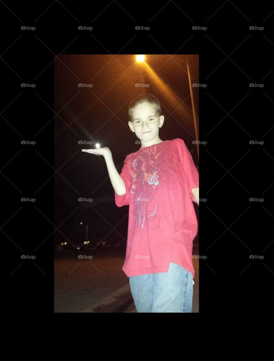 catch the moon. my son with super moon in his hand