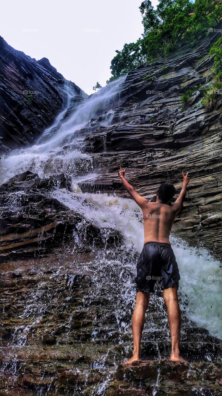 Summer vacation with beautiful waterfall