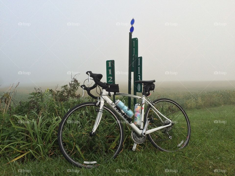 Misty morning bike. Stop during morning bicycle ride