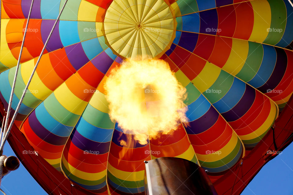 Light My Fire. Looking up into a hot air balloon from the basket
