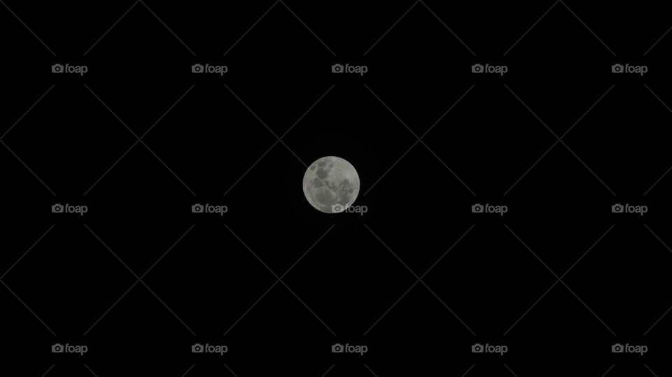 full moon on dec 3, 2017 above jakarta,  indonesia
