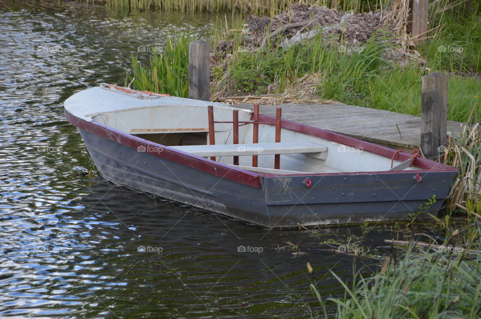 Rowboat In The River