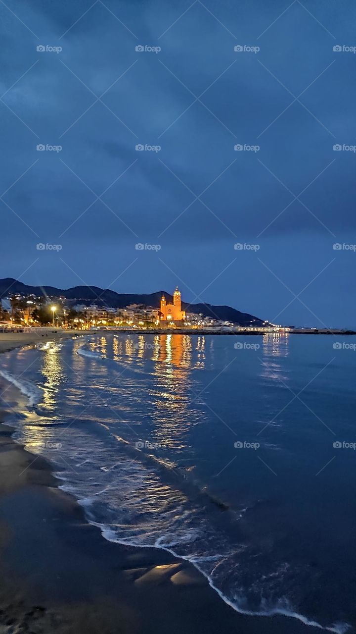 Illuminated church at night.