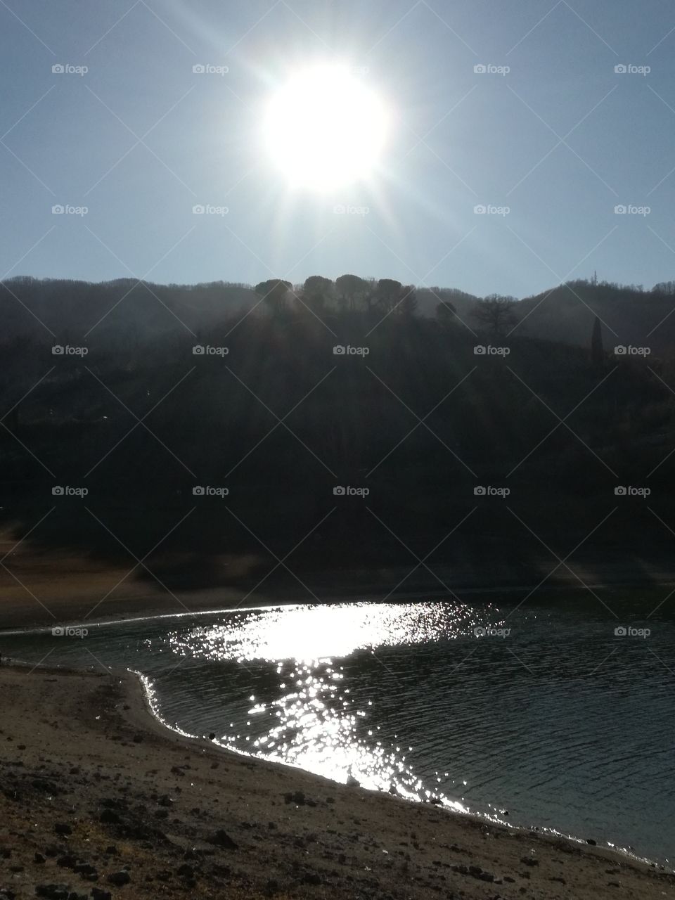 The water Is like a mirror forse the sun😉