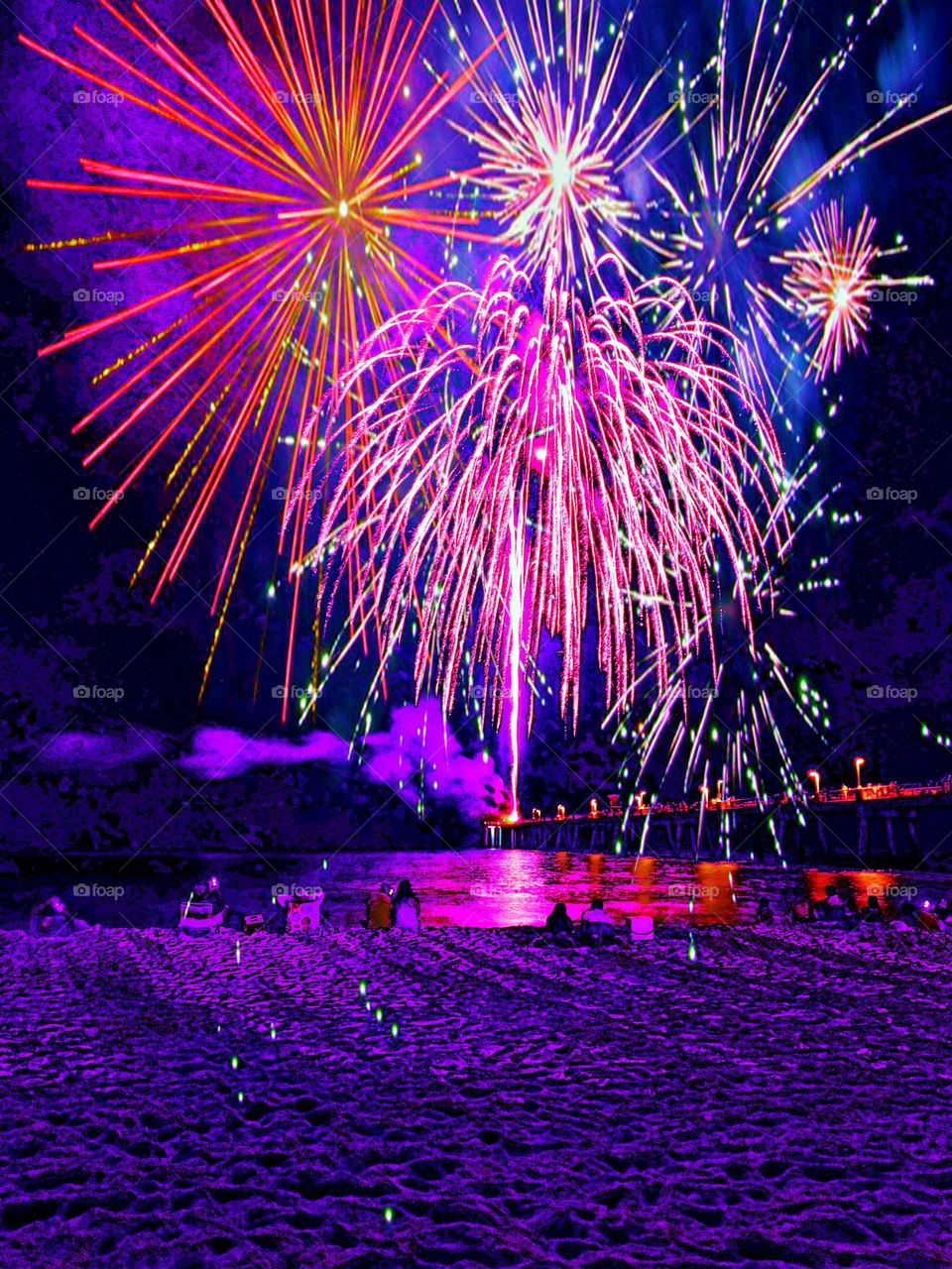 Spotted Pink - People watching a Spectacular pink fireworks display on the Gulf of Mexico - 