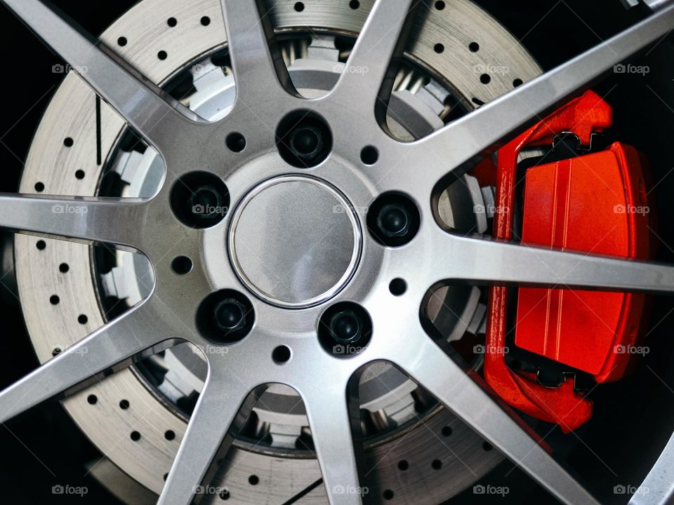 Close-up of a sportscar wheel and brake disc
