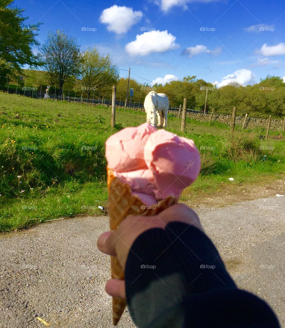 Hand holding ice cream 