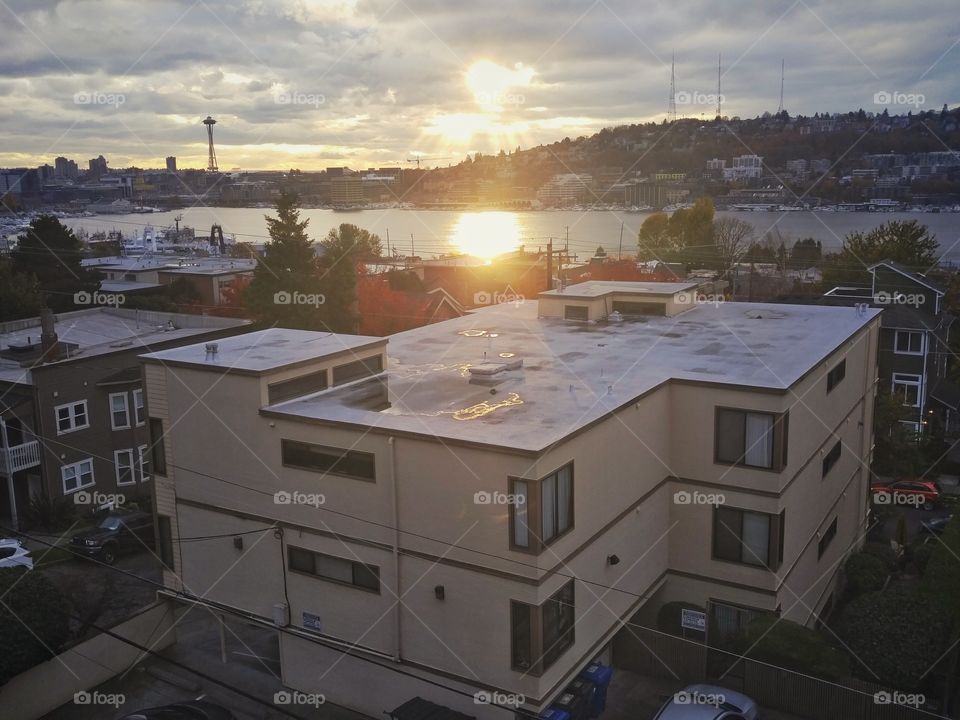 Rooftop Sunset Over Seattle. Beautiful sunset over Lake Union from a city rooftop in Seattle