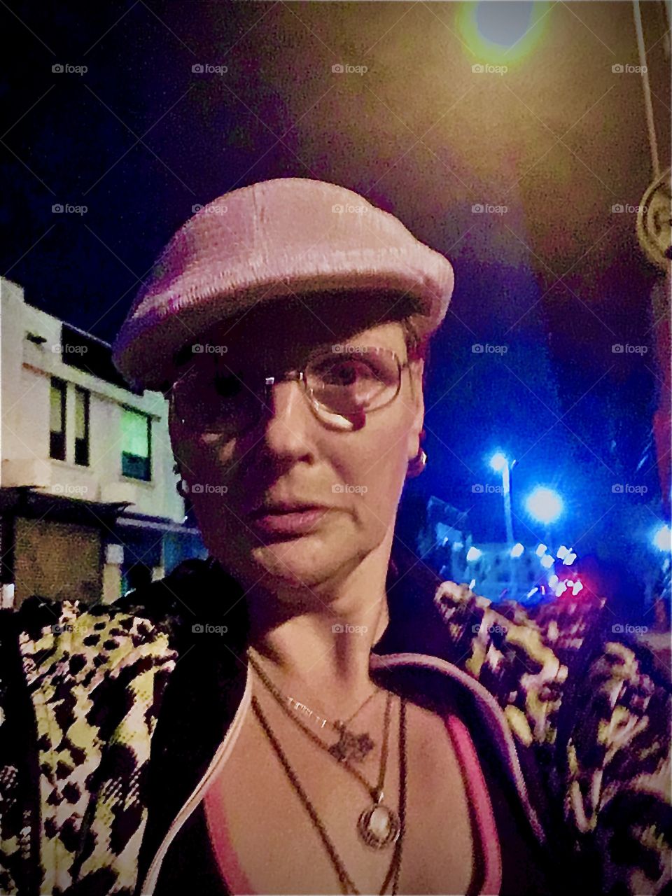 A self portrait with stark contrasting lighting from the street lanterns and the neon lights at the takeout stand underneath the Pulaski Bridge in Long Island City, Queens, New York photographed in October 2020. Hypnotic Productions