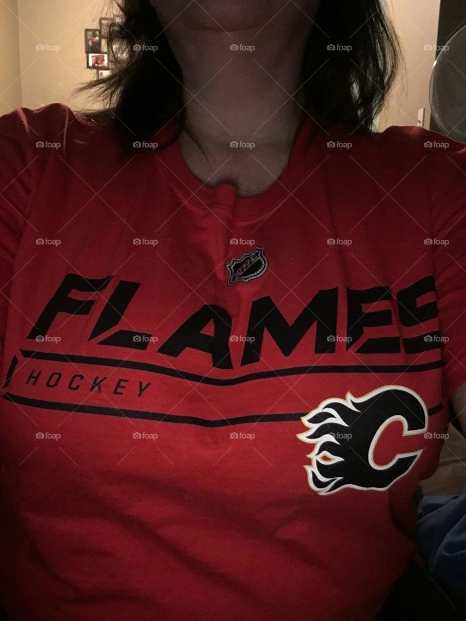 Funky, colourful red, black, white, and yellow, Calgary Flames NHL tshirt that this middle aged, plus sized lady, got as a gift for her birthday