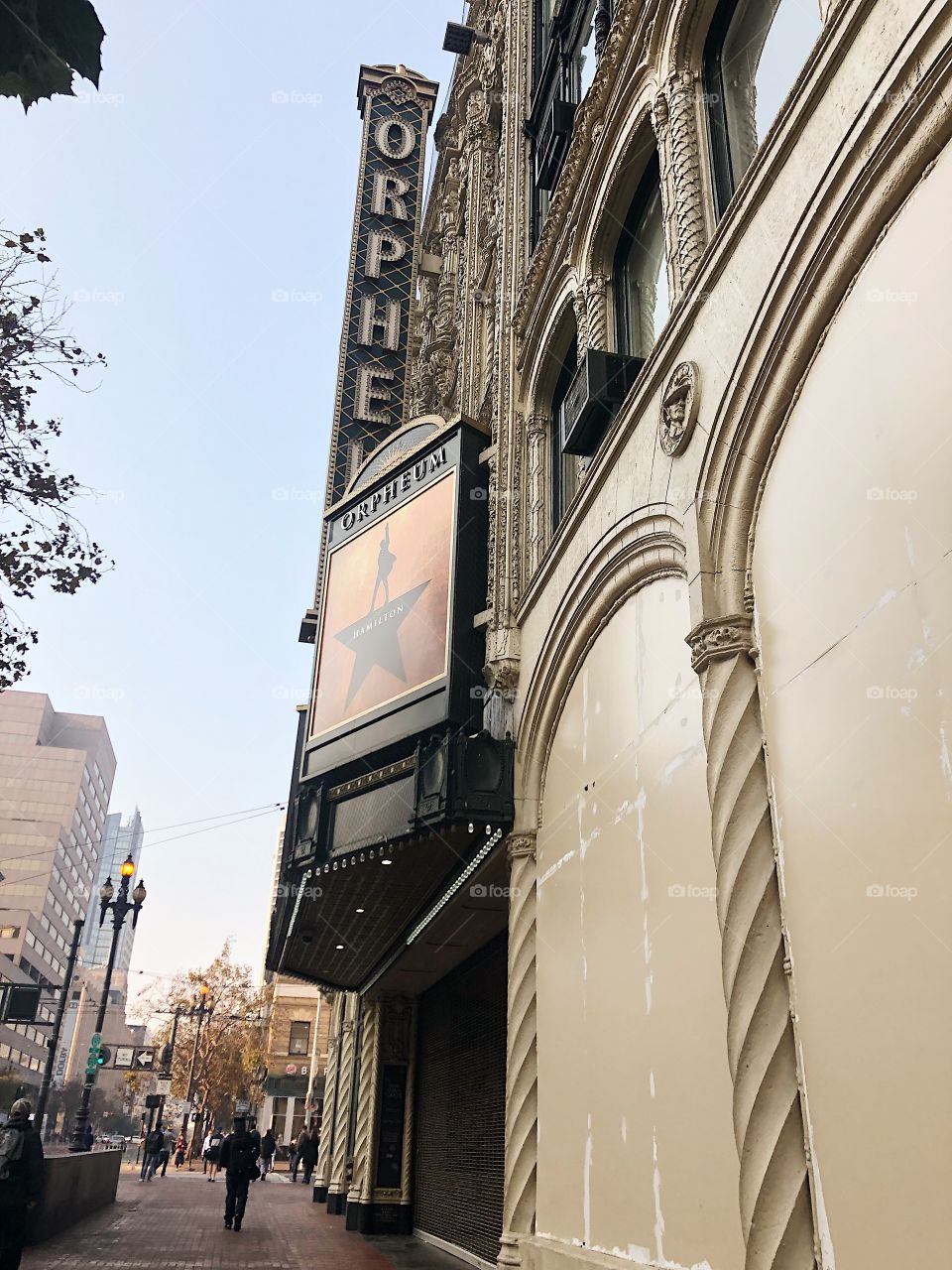 Hamilton theater in San Francisco, shot in the morning. The color scheme is soft, displaying the gold on the blue sky.
