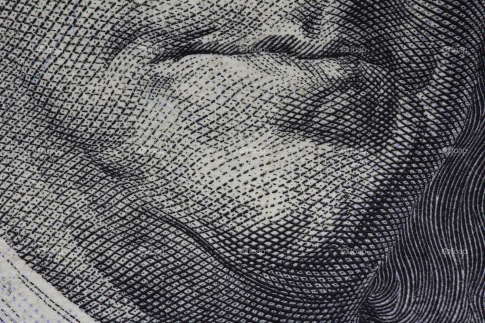 President Franklin's lips on a hundred dollar bill. macro shot