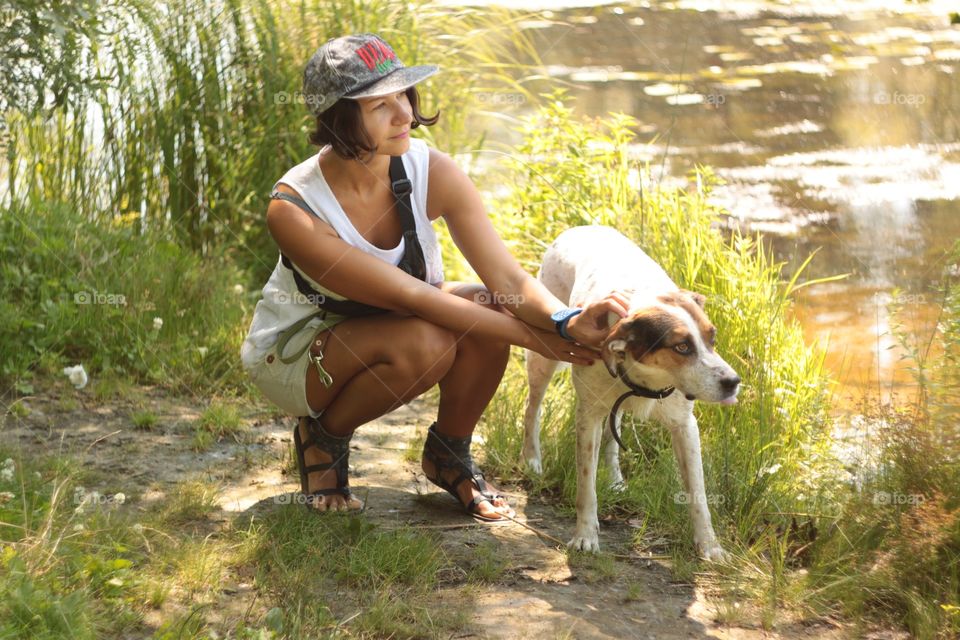 Pretty brunette with funny dog