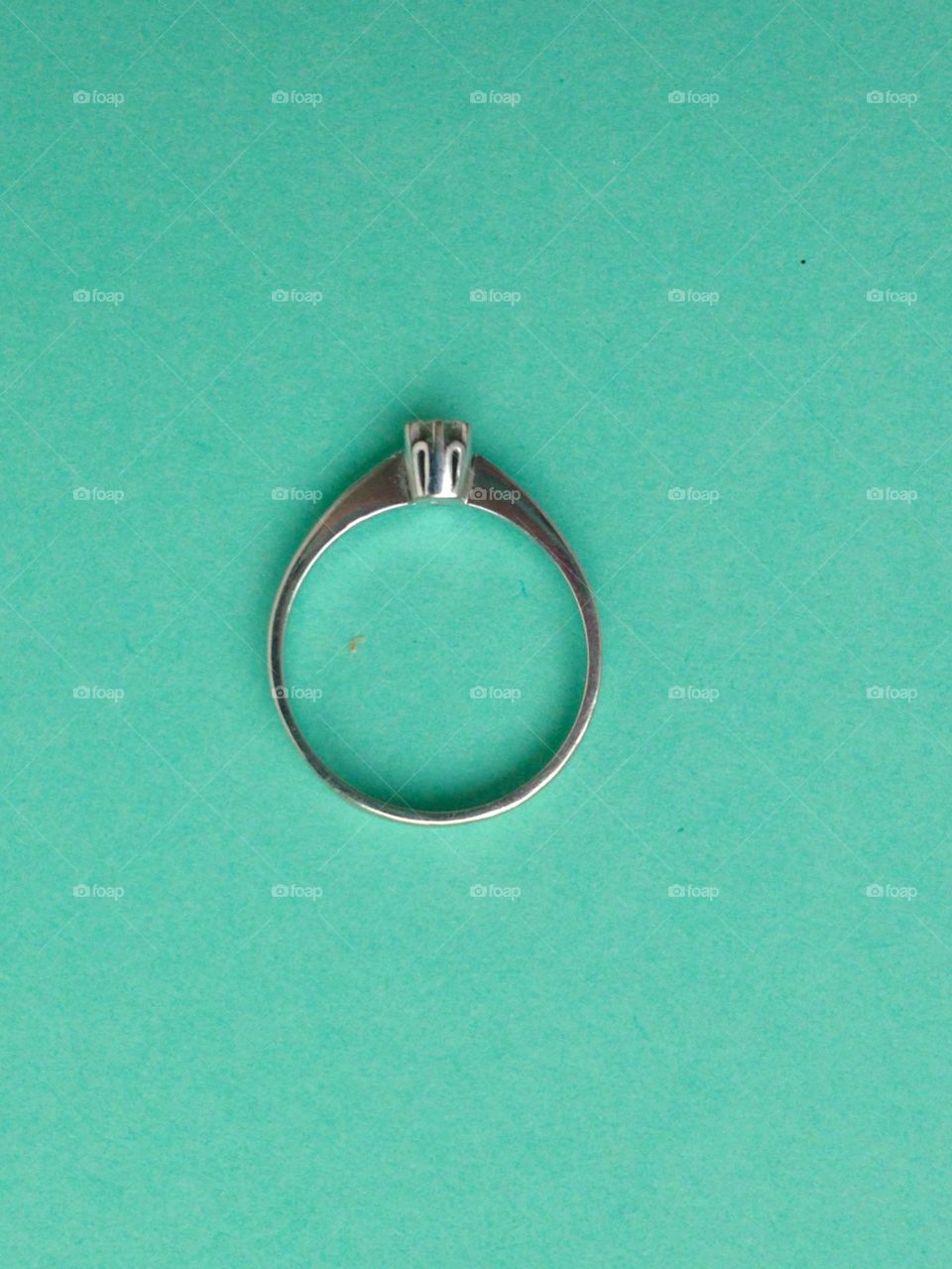 Ring on green background 