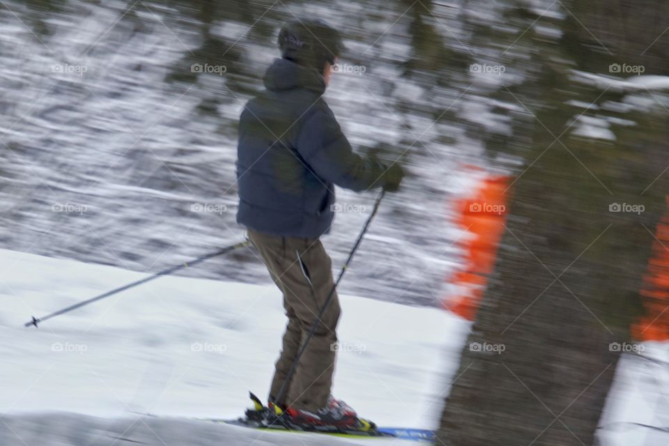 Panning Of Man Skiing