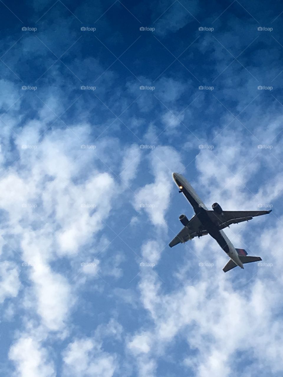 Airplane flying through clouds 