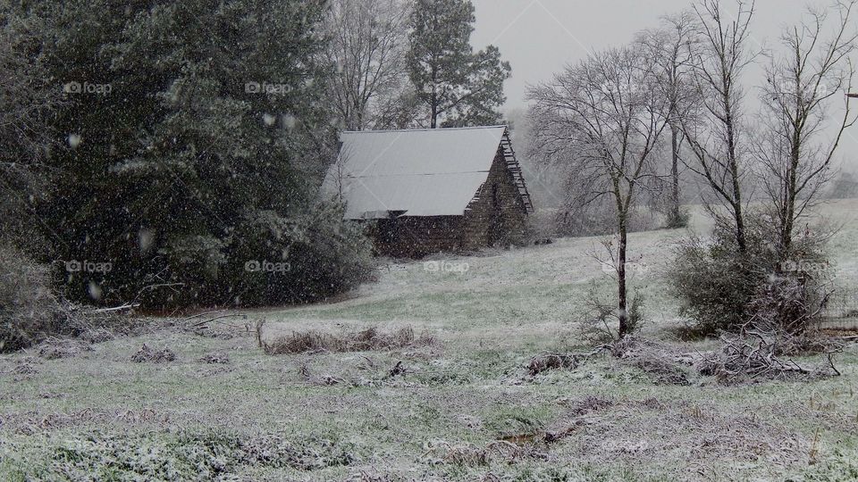 old barn on a snowy day