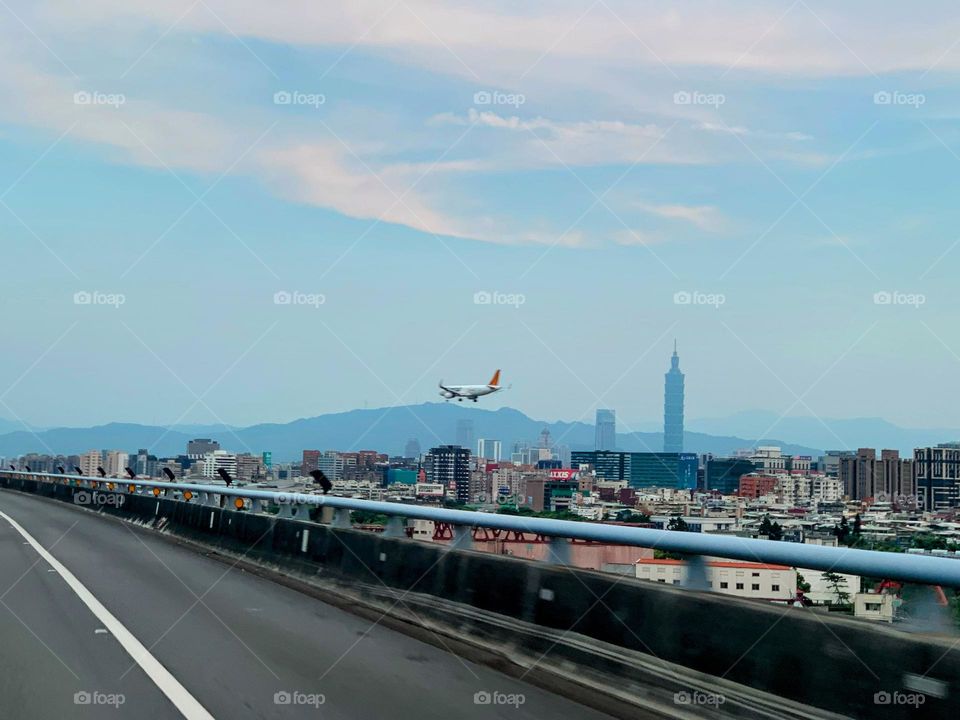 Flying over the city and mountain 