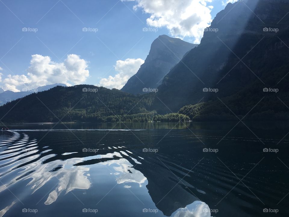 Cloud reflecting on lake