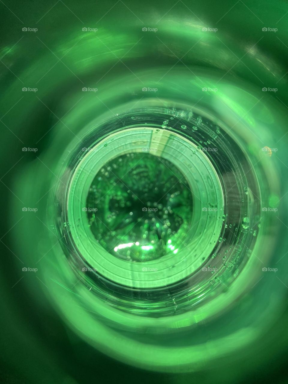 A shot of the inside of a San Pellegrino water bottle while quenching my thirst and playing around on a recent hot summer day. Sparking water and brilliant green capture the spirit of summer.