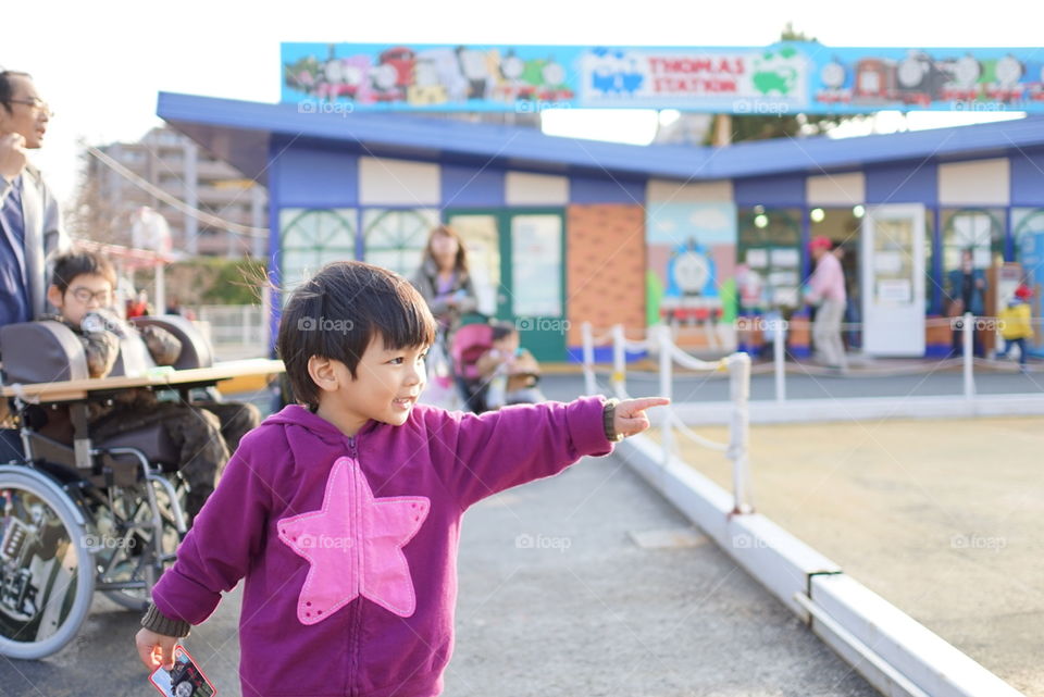 Japanese boy pointing hand