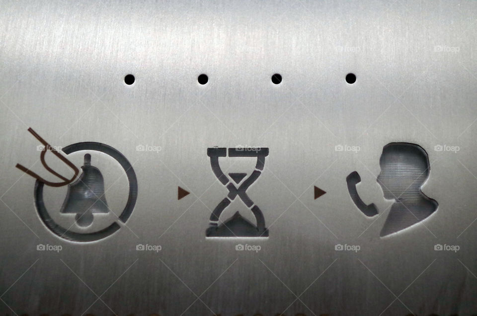 Close-up of symbols on metal in Berlin, Germany.