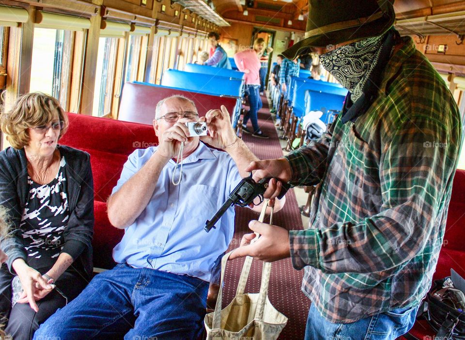 Grandpa shoots gangster - with his camera