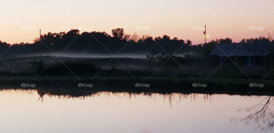 Fog rolling in over the pond.