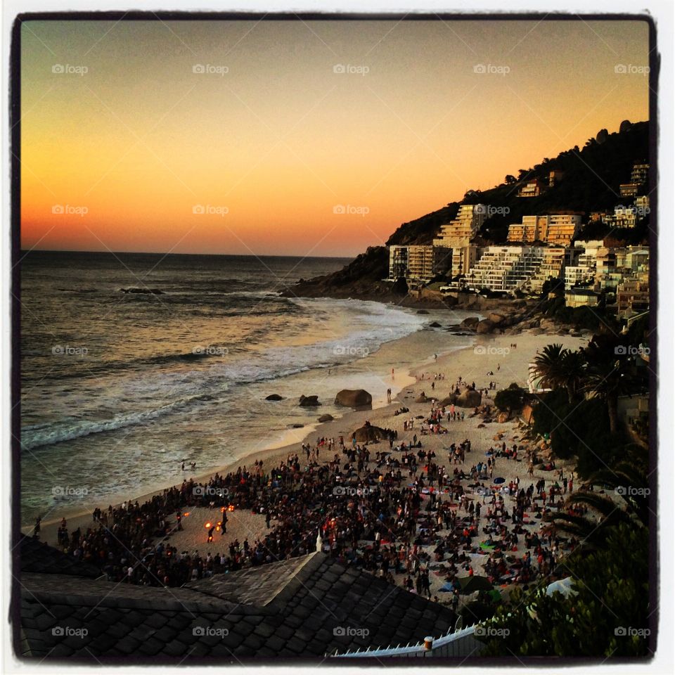 Clifton fire twirling. A gathering on clifton 2nd beach at sunset of fire twirlers, hippies picnics and sharing love 
