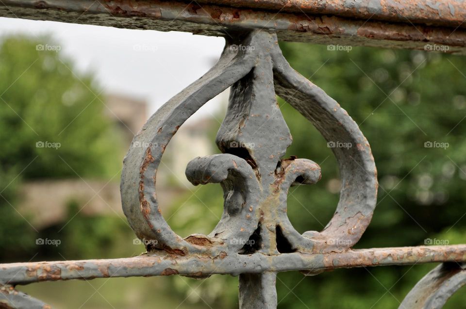 Rusted painted metal detail of balustrade 