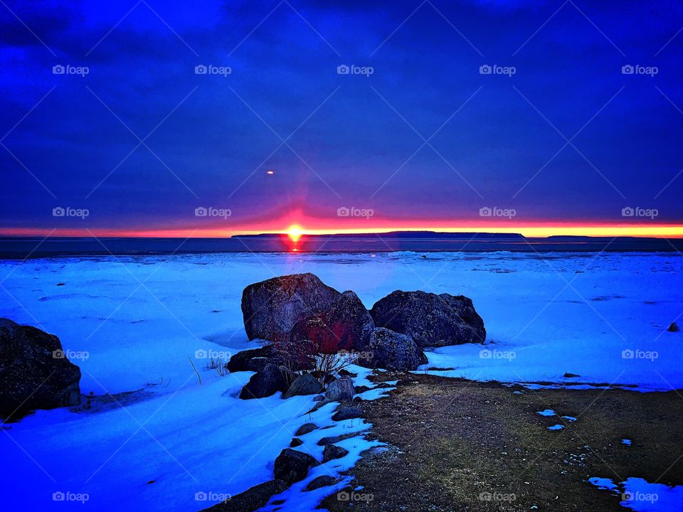 Sunset over the snowy landscape