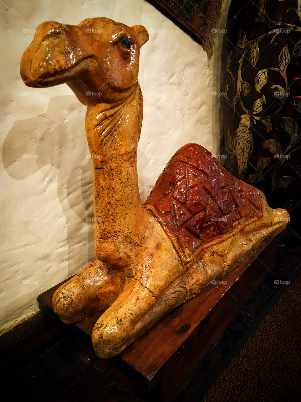 Oriental shades.  Camel made of wood