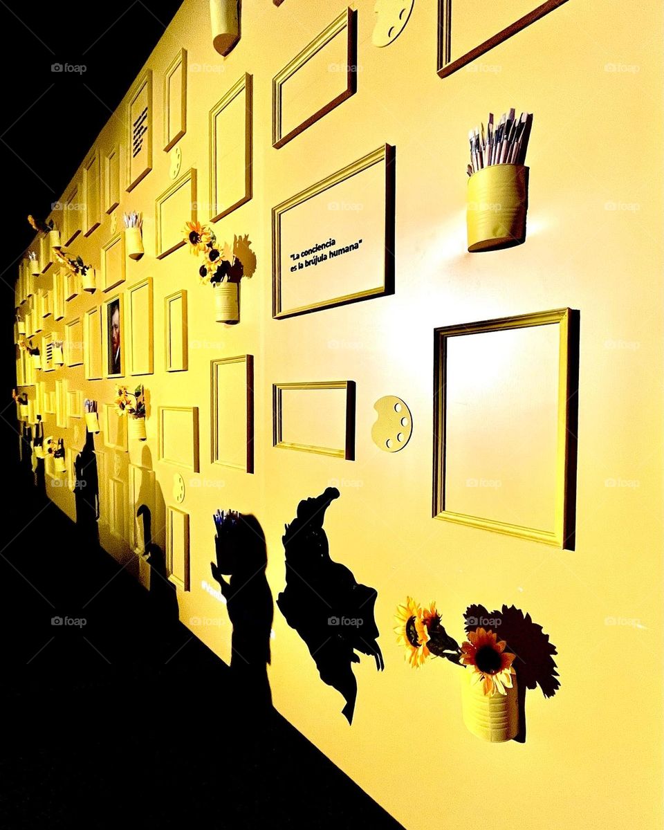 A wall with shades of shapes 