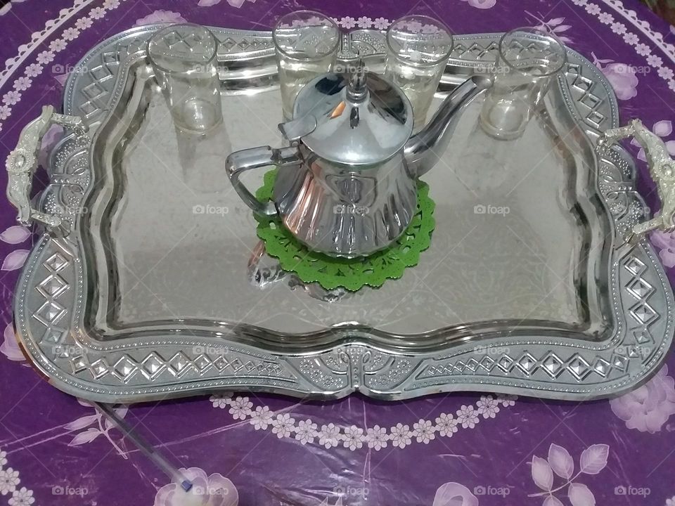tray with teapot and glasses "a sign of hospitality"