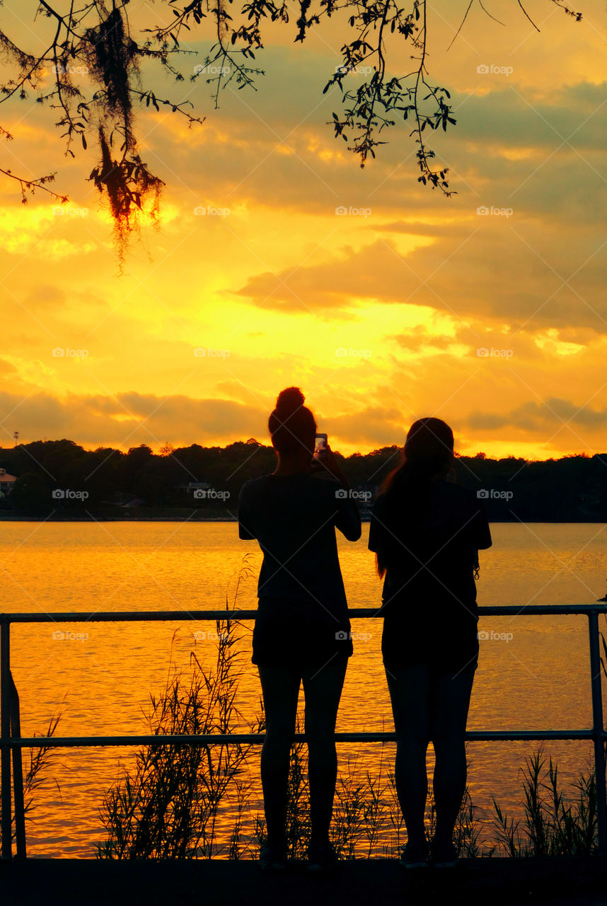 Amazing Silhouettes! Like the meeting of two worlds - the known and the unknown. The sun is like a great big romantic, inspirational fire in the sky. Brilliant streaks of yellow, orange, gold, blue, pink and red overcome the blue and purple of the sky. The sky resembled a prism; all the colors blended perfectly together. It's as if the colors and intensity of the light is just right! My work is done for today. I'm not sure what tomorrow will bring, but I'll be prepared for it!