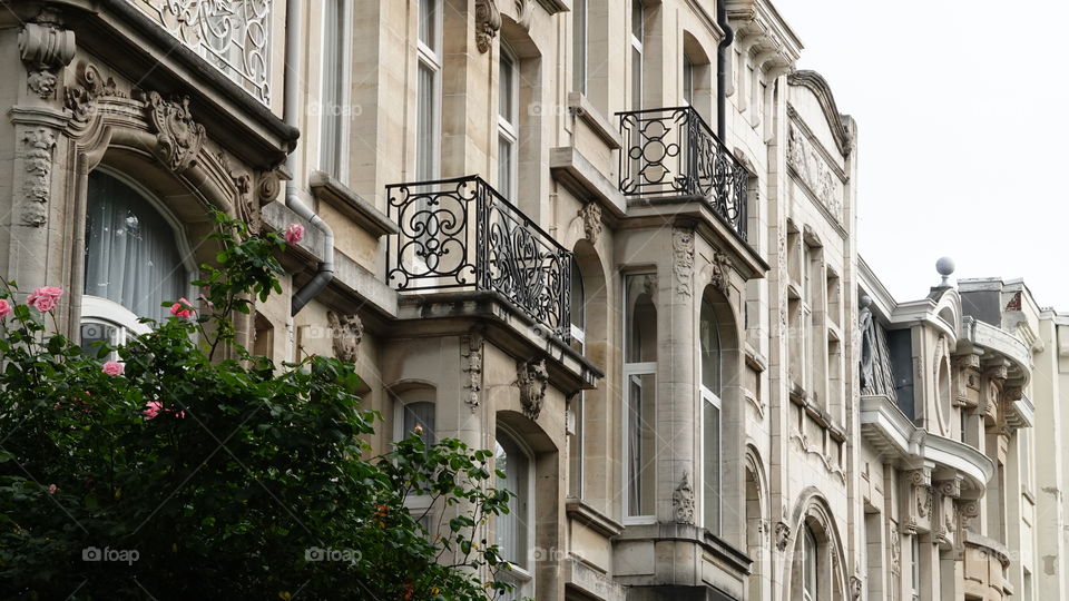 Facade of old houses in a street in Antwerp, Belgium.