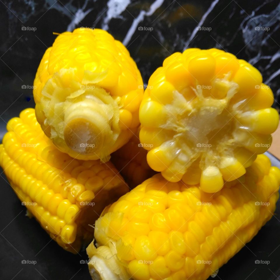 Steamed corn on the table