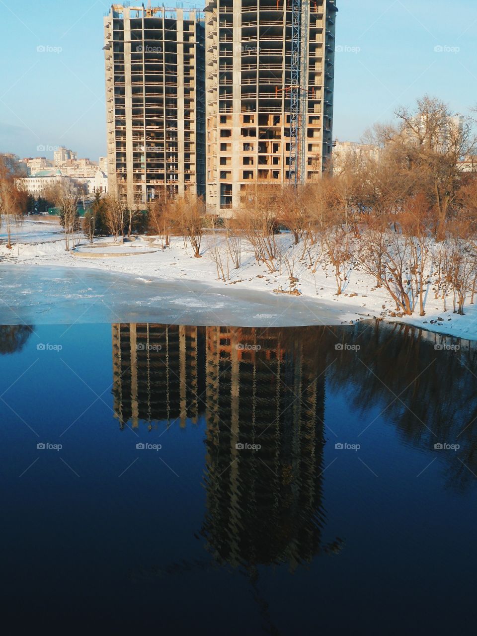 an incredible reflection of buildings in the river Dnepr