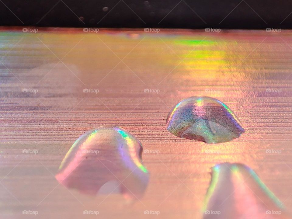 Droplets on a colourful background