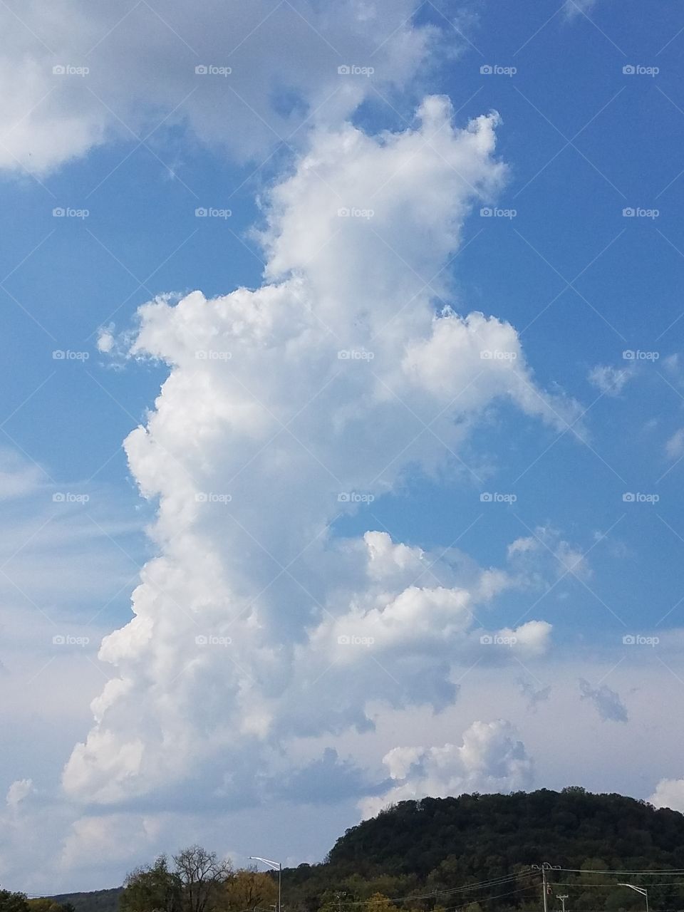 in this cloud i could see a kids from heaven. 
it touched my heart