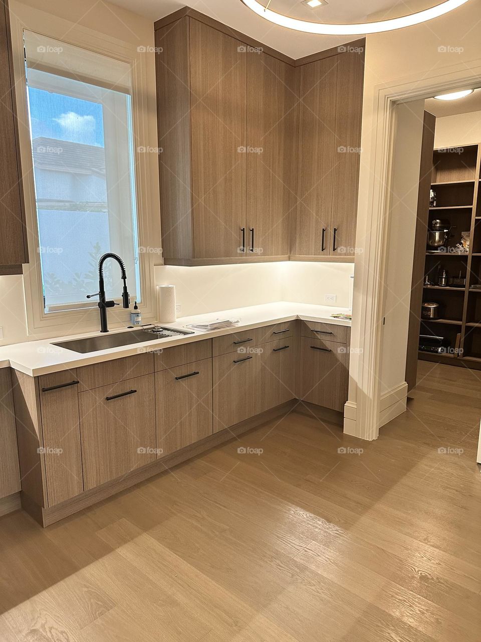 Kitchen sink in newly remodeled kitchen, fancy remodeled kitchen, brand new chef’s kitchen, setting up clients kitchen, personal chef cooks for clients