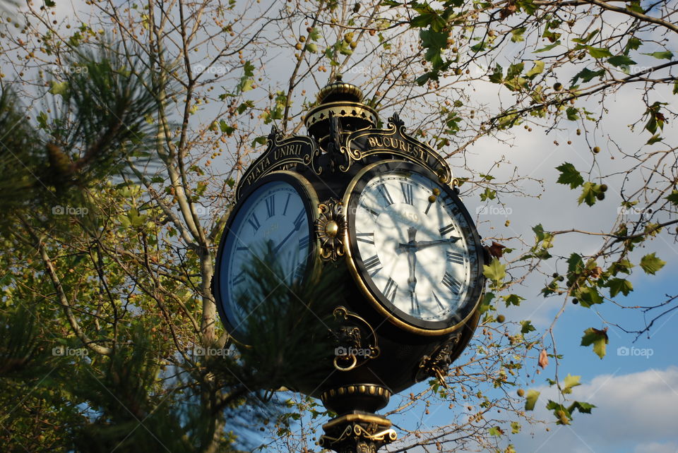 Gilded large clock in Bucharest